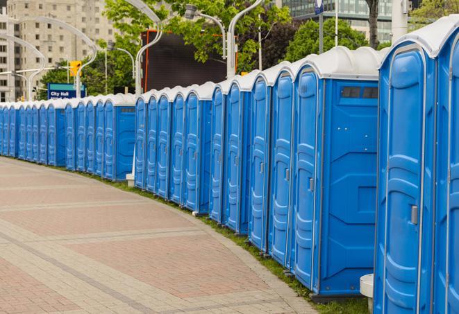 a row of portable restrooms at a fairground, offering visitors a clean and hassle-free experience in stow